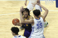 LSU's Trendon Watford, left, is pressured by Kentucky's Lance Ware (55) during the first half of an NCAA college basketball game in Lexington, Ky., Saturday, Jan. 23, 2021. (AP Photo/James Crisp)