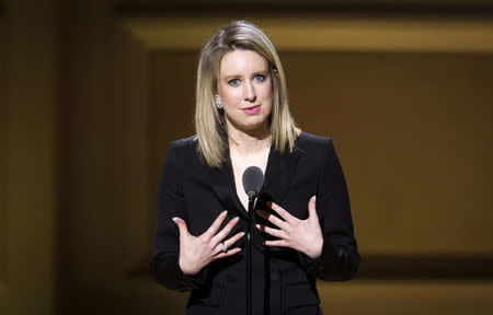 FILE PHOTO: Theranos Chief Executive Officer Elizabeth Holmes speaks on stage at the Glamour Women of the Year Awards where she receives an award, in the Manhattan borough of New York, U.S., November 9, 2015. REUTERS/Carlo Allegri/File Photo