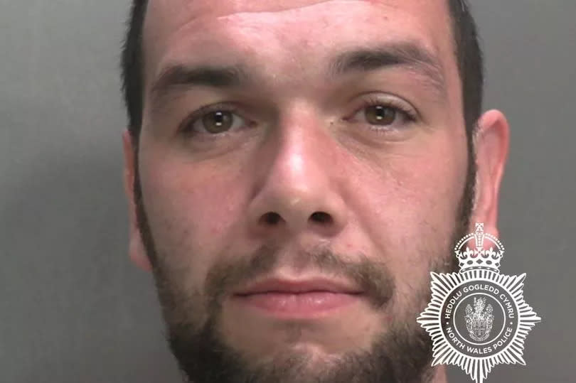 Ryan Moore, 32, of New Hall Road, Ruabon, Wrexham was jailed for 30 months for burglary and six months, consecutively, for possession of a bladed article at Mold Crown Court.