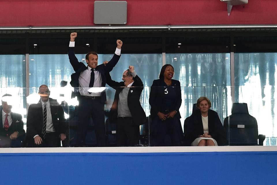 <p>French President Emmanuel Macron (C-L) celebrates, alongside French Football Federation (FFF) president Noel Le Graet (C) and French Sports Minister Laura Flessel, at the end of the Russia 2018 World Cup semi-final football match between France and Belgium at the Saint Petersburg Stadium in Saint Petersburg on July 10, 2018. – France reached the World Cup final on Tuesday after a second-half header from Samuel Umtiti gave them a 1-0 win against Belgium. (Photo by Giuseppe CACACE / AFP) </p>