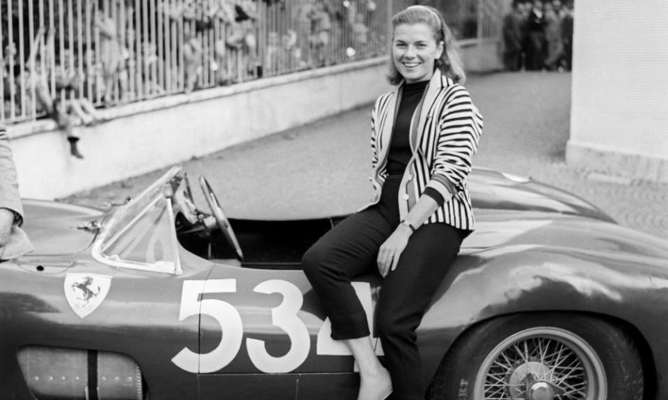 Louise King with Peter Collins’s car at the Mille Miglia race in 1957.