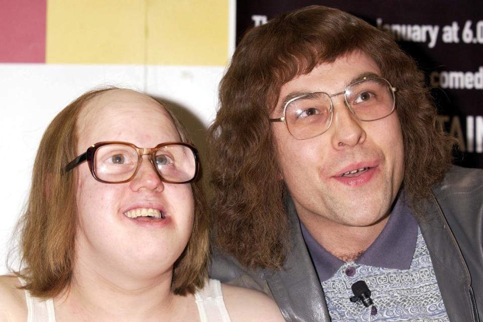 Comedians Matt Lucas as Andy (in wheelchair) and David Walliams as Lou, during a photocall for the signing of their new comedy audio CD 'Little Britain', based on the BBC radio series, at the Virgin  Megastore in Piccadilly, central London.   (Photo by Yui Mok - PA Images/PA Images via Getty Images)