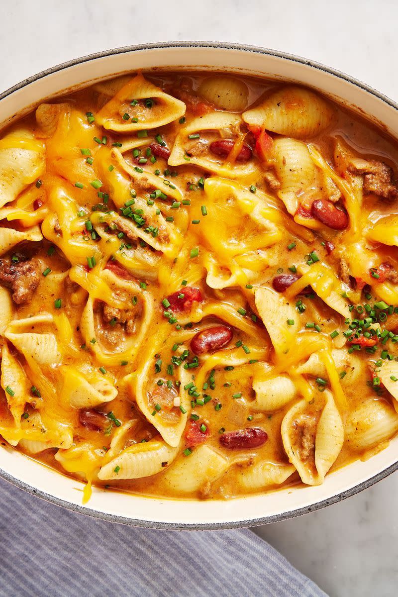 <p><a href="https://www.delish.com/uk/cooking/recipes/a28830973/3-cheese-mac-recipe/" rel="nofollow noopener" target="_blank" data-ylk="slk:Mac and cheese;elm:context_link;itc:0;sec:content-canvas" class="link ">Mac and cheese</a> remains one of our favourite meals no matter how old we get. This chilli mac changes things up a bit and makes this a heftier meal that's very shareable. Make it in the dead of winter to awaken your soul and grab a spoon to dig in!</p><p>Get the <a href="https://www.delish.com/uk/cooking/recipes/a30992735/chili-mac-cheese-recipe/" rel="nofollow noopener" target="_blank" data-ylk="slk:Chilli Mac & Cheese;elm:context_link;itc:0;sec:content-canvas" class="link ">Chilli Mac & Cheese</a> recipe.</p>