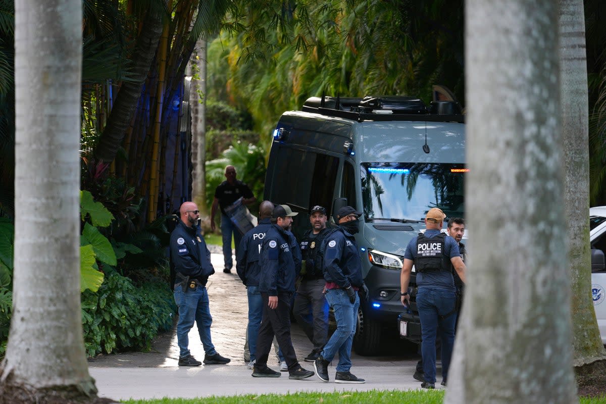 Federal agents at Diddy’s home in Star Island, Miami Beach, during the raid (Copyright 2024 The Associated Press. All rights reserved.)