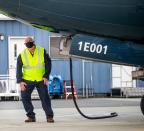 FAA chief Steve Dickson walks around a Boeing 737 MAX, conducting a pre-flight check ahead of take-off from Boeing Field in Seattle on Wednesday, Sept. 30, 2020. Dickson, a pilot who flew for the military and Delta Air Lines, was expected to sit in the captain’s seat during a two-hour flight. The Max has been grounded since March 2019, after the second crash. (Mike Siegel/The Seattle Times via AP, Pool)