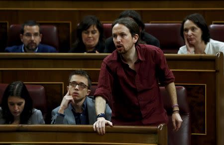 Podemos (We Can) leader Pablo Iglesias stands as he votes during an investiture debate at the parliament in Madrid, Spain, March 4, 2016. REUTERS/Juan Medina