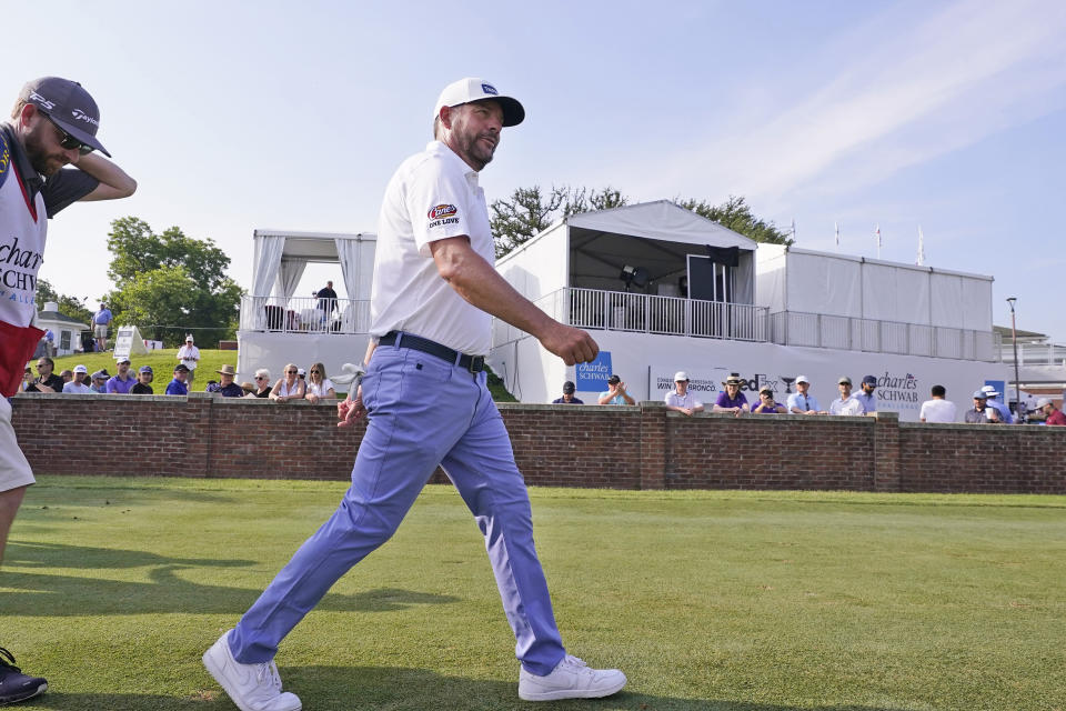 Michael Block walks down the fairway after his tee shot on the 10th hole during the second round of the Charles Schwab Challenge golf tournament at the Colonial Country Club in Fort Worth, Texas, Friday, May 26, 2023. (AP Photo/LM Otero)