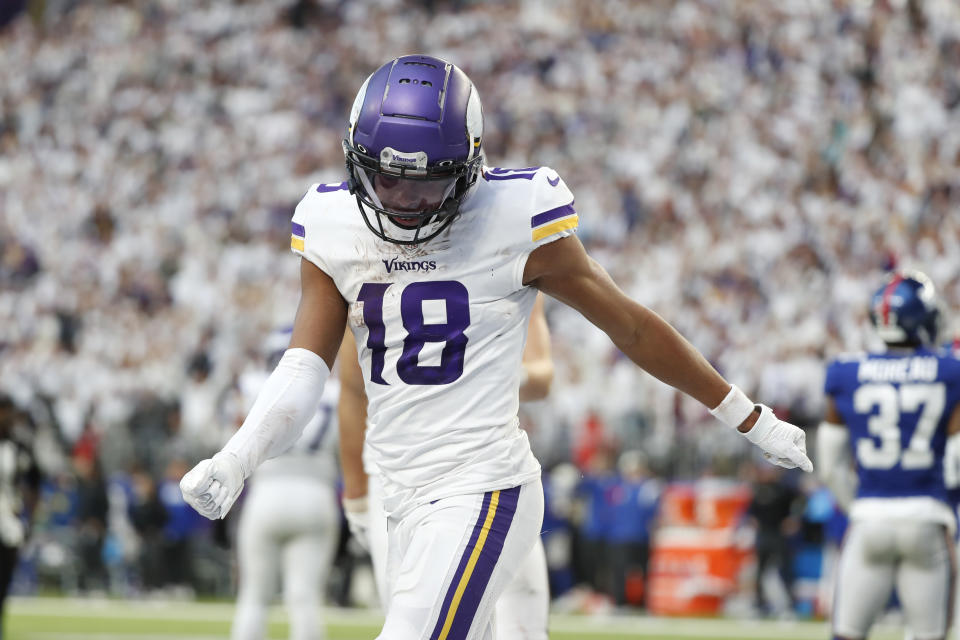 Minnesota Vikings wide receiver Justin Jefferson celebrates after catching a 17-yard touchdown pass during the second half of an NFL football game against the New York Giants, Saturday, Dec. 24, 2022, in Minneapolis. (AP Photo/Bruce Kluckhohn)