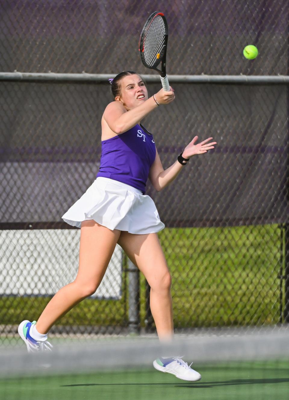 Bloomington South’s Maddie Santner hits a forehand during her No. 1 singles match against Bloomington North’s Keira Murphy during the tennis match at South on Thursday, April 25, 2024.