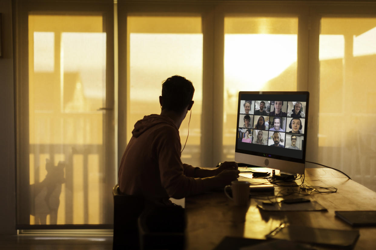 A young person at his computer