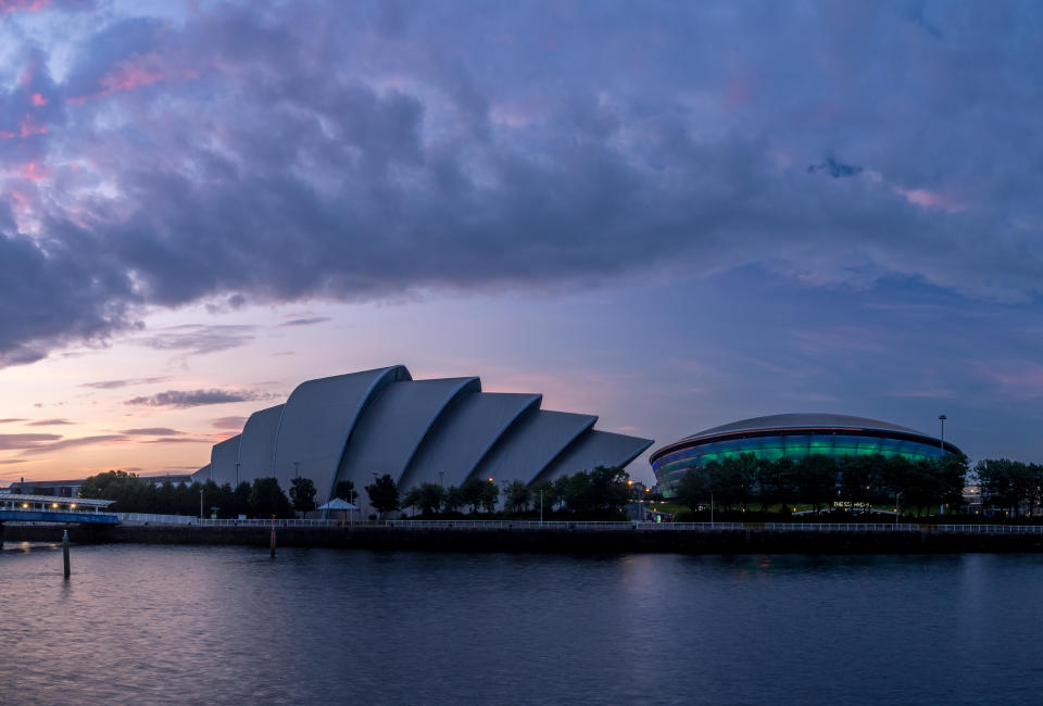 Glasgow, UK - July 21, 2017: The beautiful River Clyde in Glasgow Scotland with the SEC Armadillo and the SSE Hydro. The SEC Armadillo and the SSE Hydro are part of Glasgow's modern entertainment and conference district.