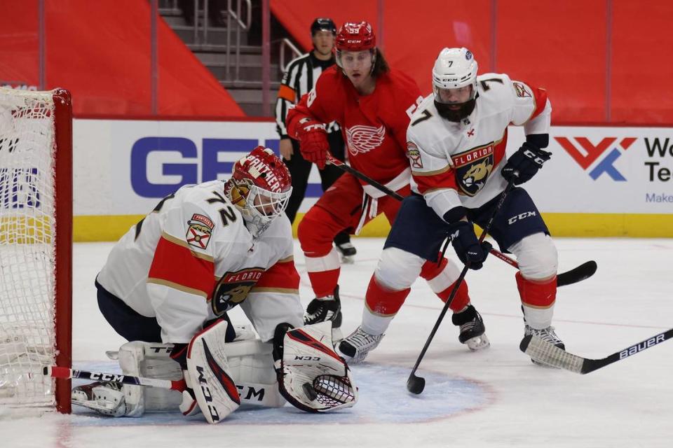 Sergei Bobrovsky #72 of the Florida Panthers makes a second period save in front of Tyler Bertuzzi #59 of the Detroit Red Wings at Little Caesars Arena on January 30, 2021 in Detroit, Michigan.