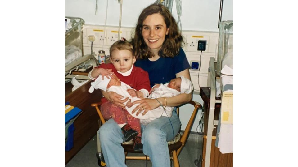 Tana Ramsay holding daughter Megan and twins Jack and Holly as babies