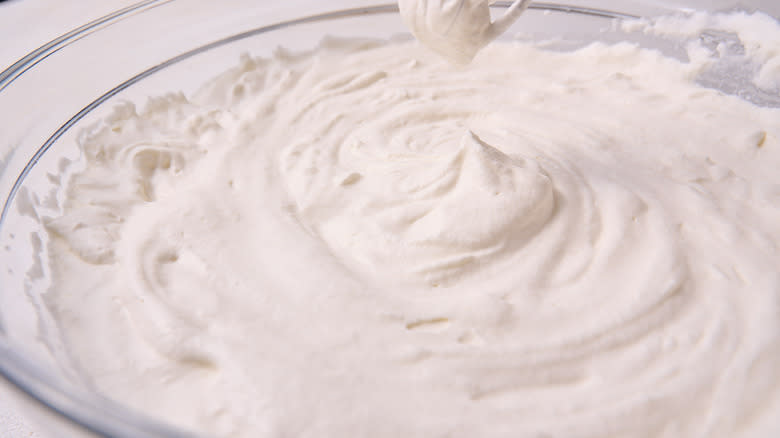 close up of stiff peaks in cream