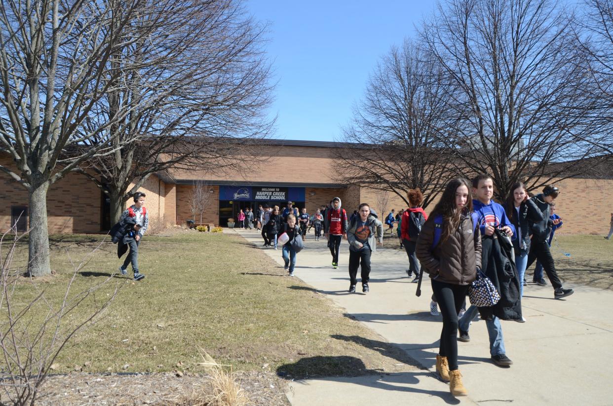 Children heading home from Harper Creek Middle School March 27, 2019. The district has been award a $1.74 million grant to help with teacher development.