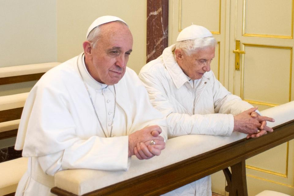 Pope Emeritus Benedict XVI (right) and Pope Francis praying in Castel Gandolfo in 2013 (AFP/Getty)