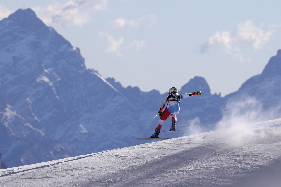 Switzerland's Priska Nufer speeds down the course during an alpine ski, women's World Cup downhill training, in Cortina d'Ampezzo, Italy, Friday, Jan. 21, 2022. (AP Photo/Alessandro Trovati)
