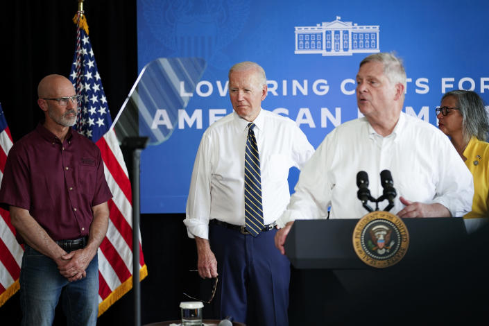 Agriculture Secretary Tom Vilsack speaks as President Joe Biden stands with Jeff O'Connor, owner of O'Connor Farms, left, and Rep. Robin Kelly, D-Ill., right, during a visit to O'Connor Farms, Wednesday, May 11, 2022, in Kankakee, Ill. Biden visited the farm to discuss food supply and prices as a result of Putin's invasion of Ukraine. (AP Photo/Andrew Harnik)