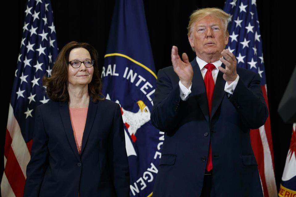 President Donald Trump applauds incoming Central Intelligence Agency director Gina Haspel during a swearing-in ceremony at CIA Headquarters, 21 May 2018, in Langley, Virginia: AP Photo/Evan Vucci