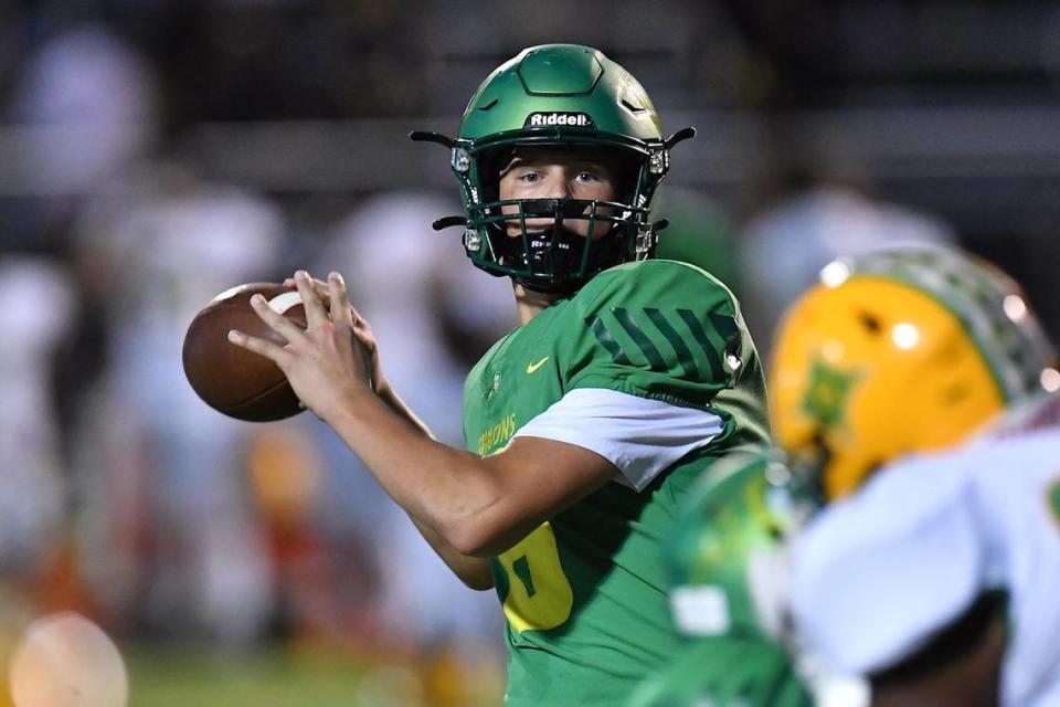 Cardonal Gibbons quarterback Whitt Newbauer (8) looks to pass against Richmond in the first half. The Cardinal Gibbons Crusaders and the Richmond Raiders met in a football game in Raleigh, N.C. on September 2, 2022. Steven Worthy/newsobserver.com