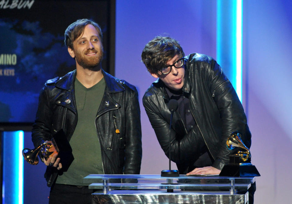 Dan Auerbach, left, and Patrick Carney accept the award for best rock album "El Camino" at the 55th annual Grammy Awards on Sunday, Feb. 10, 2013, in Los Angeles. (Photo by John Shearer/Invision/AP)