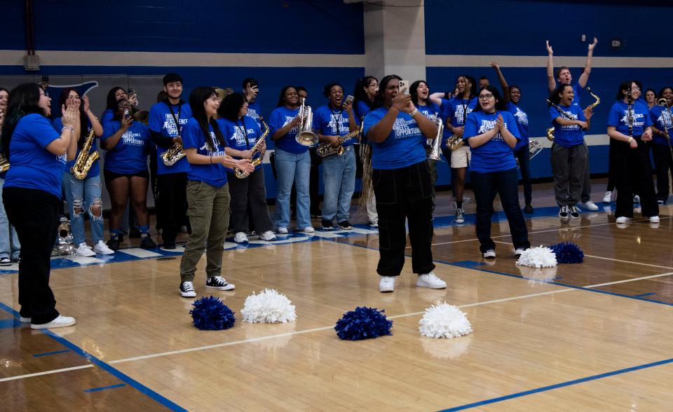 The marching band responds as Jelly Roll tells them they’re going to be performing at Antioch High School in Antioch, Tenn., Wednesday, May 8, 2024. It was the first time Jelly Roll had returned to his high school.