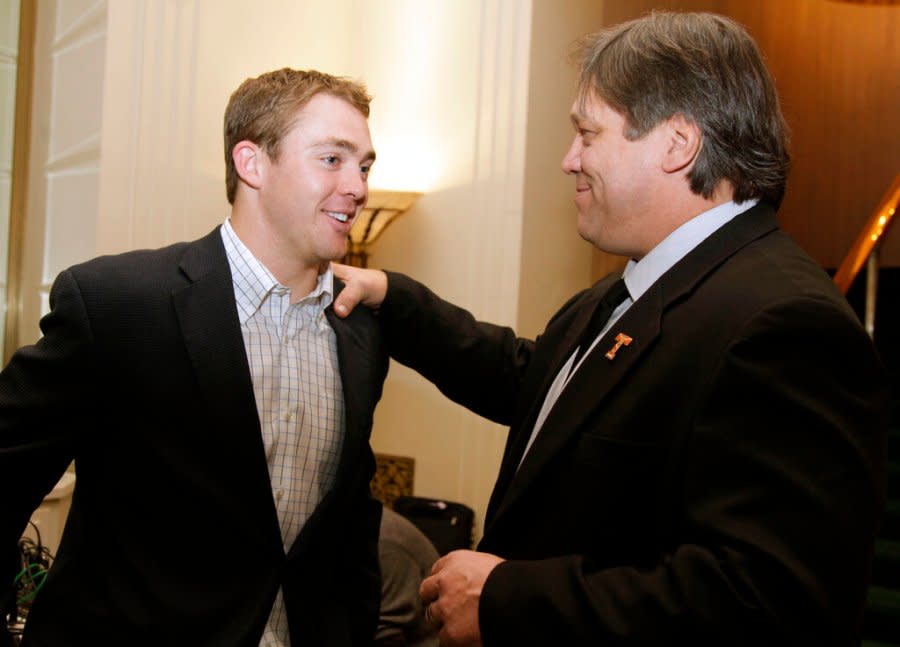 Texas quarterback Colt McCoy, left, talks with Steve McMichael, former Texas football player, at an inductees news conference for the 2009 National Football Foundation Hall of Fame, in New York, Tuesday, Dec. 8, 2009. (AP Photo/Richard Drew)
