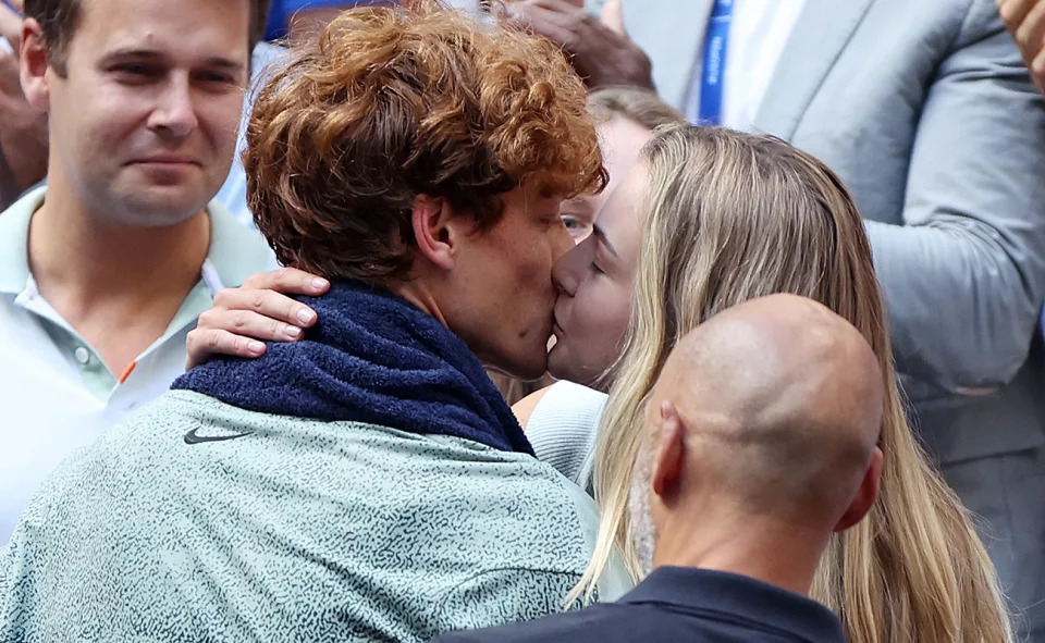 Jannik Sinner and Anna Kalinskaya, pictured here sharing a kiss after the US Open final.