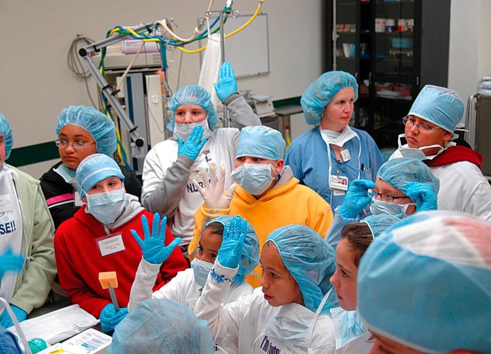 When asked who is going to be a nurse when they grow up, several children raise their hands, March 22, 2006, at Lea Regional Hospital in Hobbs, N.M. New Mexico had a nursing shortage even before the pandemic and advocates are now trying to convince lawmakers to boost funding to increase capacity at the state's nursing schools.