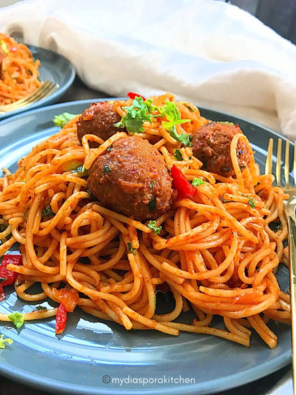 <p>My Diaspora Kitchen</p><p>This is an easy, tasty pasta recipe with a nice twist. Nigerian-style Jollof Spaghetti with Kale makes for a great side dish—and it's so delicious.</p><p><strong>Get the recipe: <a href="https://www.mydiasporakitchen.com/kale-jollof-spaghetti-n-meatballs/" rel="nofollow noopener" target="_blank" data-ylk="slk:Kale Jollof Spaghetti and Meatballs;elm:context_link;itc:0;sec:content-canvas" class="link ">Kale Jollof Spaghetti and Meatballs</a></strong></p>