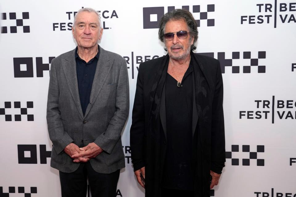 Robert De Niro, left, and Al Pacino attend a screening of "Heat" at the United Palace theater during the 2022 Tribeca Festival on Friday, June 17, 2022, in New York. (Photo by Charles Sykes/Invision/AP) ORG XMIT: NYCS302