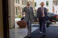 New Zealand Prime Minister Chris Hipkins is met by Australian Prime Minister Anthony Albanese, left, on his arrival to Parliament House in Canberra, Australia, Tuesday, Feb. 7, 2023. (AP Photo/Hilary Wardhaugh)