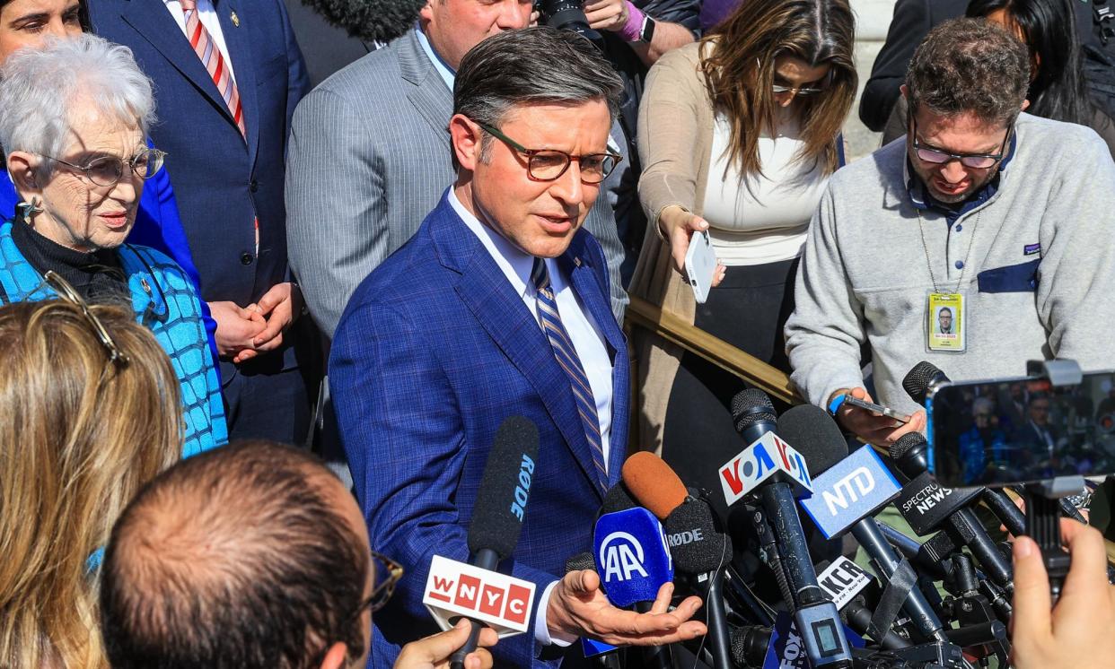 <span>Mike Johnson on Columbia University campus in New York on 24 April.</span><span>Photograph: Anadolu/Getty Images</span>