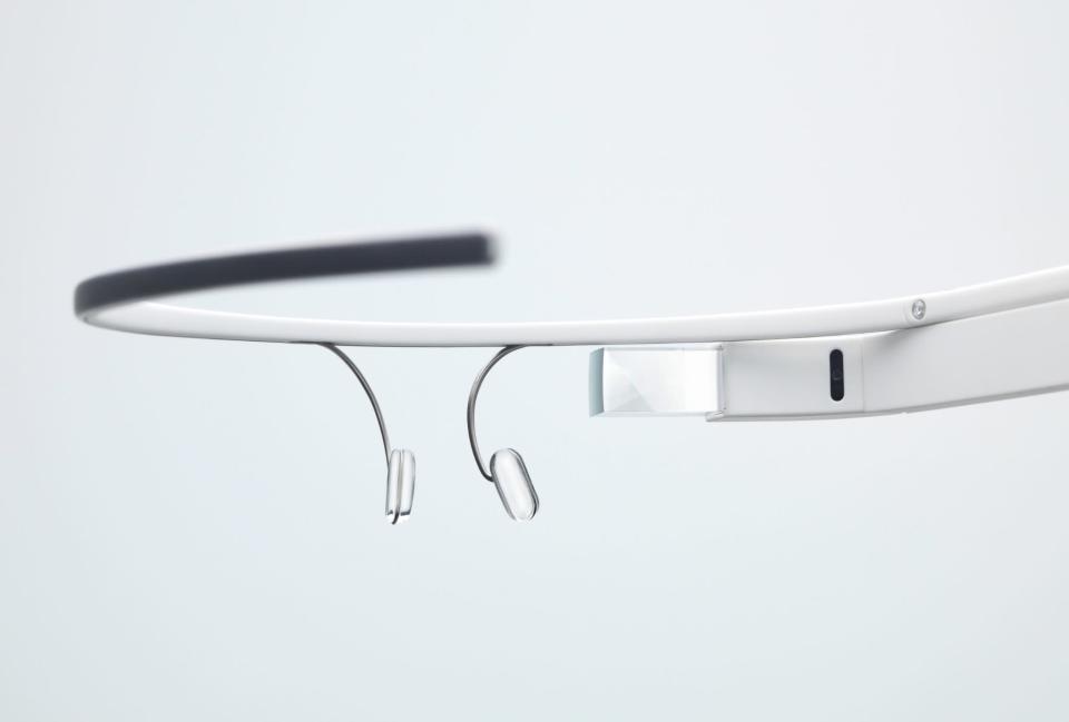 The glasses appear to run a variant of the Android operating system, using the same microphone icon and other recognisable parts of Google's mobile OS.