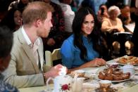 <p>The Sussex's first trip as a family (although, sadly, Archie didn't make an appearance) was to Africa <a href="https://www.townandcountrymag.com/society/tradition/g29088194/prince-harry-meghan-markle-royal-tour-africa-photos/" rel="nofollow noopener" target="_blank" data-ylk="slk:for a 10-day trip;elm:context_link;itc:0;sec:content-canvas" class="link ">for a 10-day trip</a>. Here, the new parents sit down to snack on Cape Malay koesisters, which is a local pastry in the area that's similar to a donut. </p>