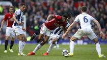 <p>West Bromwich Albion’s Claudio Yacob, Jake Livermore and Jonny Evans in action with Manchester United’s Marcus Rashford </p>