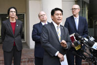 U.S. Attorney Robert Hur, third from left, speaks outside U.S. District Court in Baltimore, Thursday, Nov. 21, 2019. On Nov. 20 he announced an 11-count federal indictment against former Baltimore mayor Catherine Pugh, accusing her of arranging fraudulent sales of her "Healthy Holly" books to schools, libraries and a medical system to enrich herself, promote her political career and fund her run for mayor. (AP Photo/Steve Ruark)