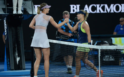 Maria Sharapova (L) of Russia greets Angelique Kerber (R) of Germany during women's singles third round match within the sixth day of 2018 Australia Open tennis tournament at Melbourne Park in Melbourne, Australia on January 20, 2018 - Credit: Getty Images