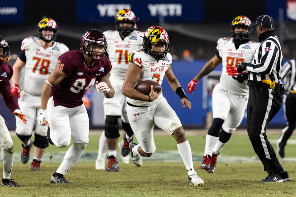 Maryland QB Taulia Tagovailoa carries the ball during the Pinstripe Bowl on Dec. 29. (Dustin Satloff/Getty Images)
