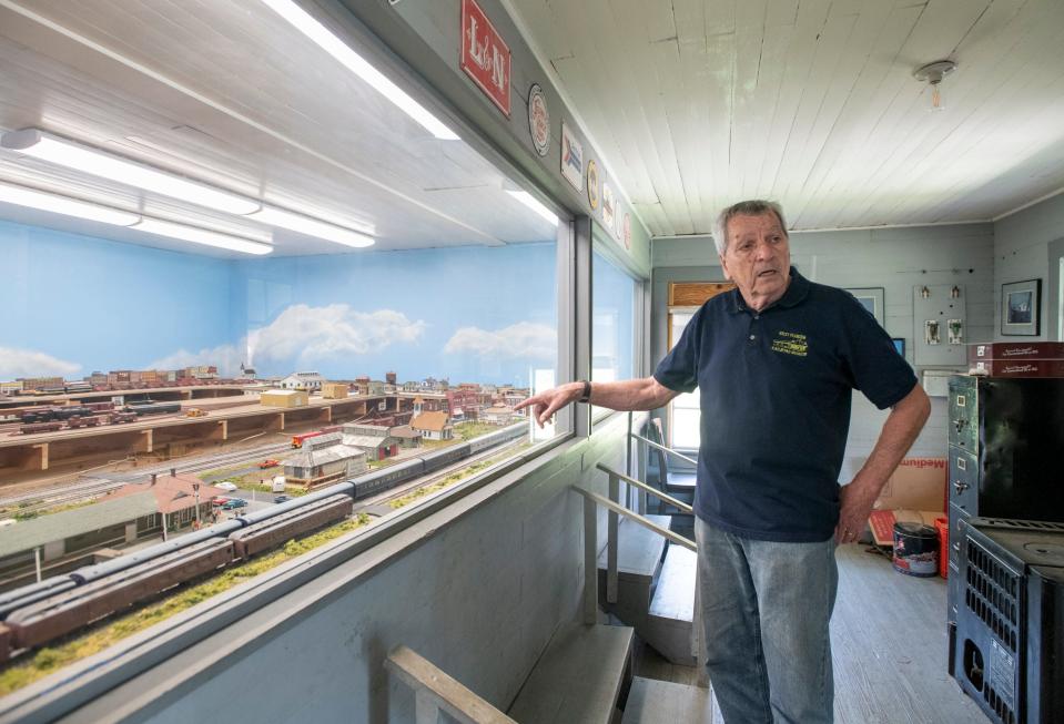 West Florida Railroad Museum President George Wilson talks Friday about the model train display set up in the bridge tender&#39;s house at the museum in Milton.