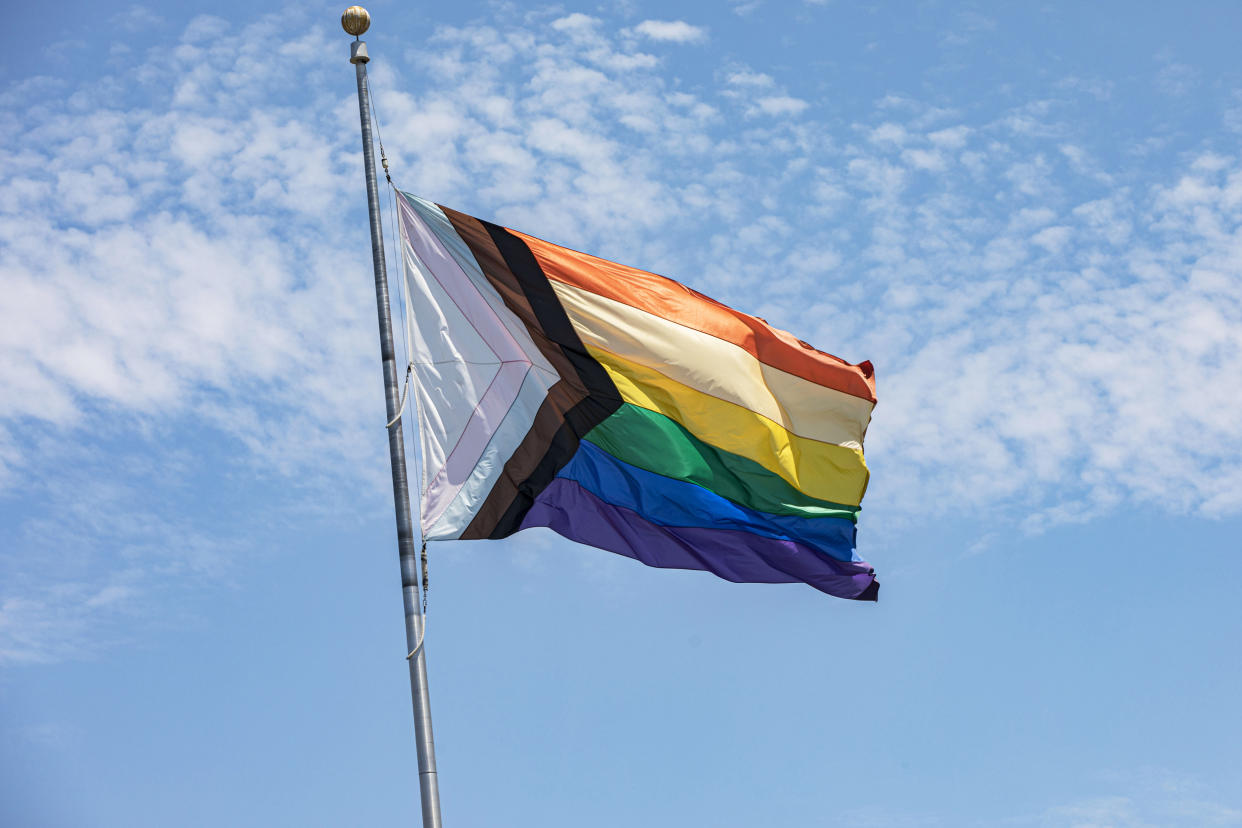 A pride flag flutters in the wind on July 10, 2021, in San Diego, Calif. (Daniel Knighton / Getty Images file)