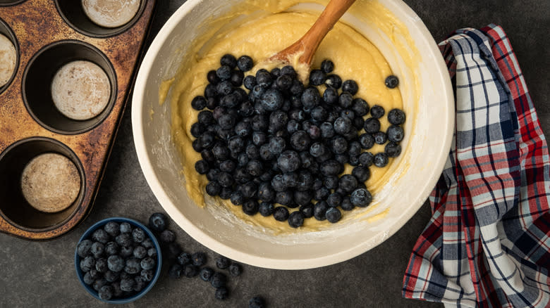 Blueberries in batter in mixing bowl