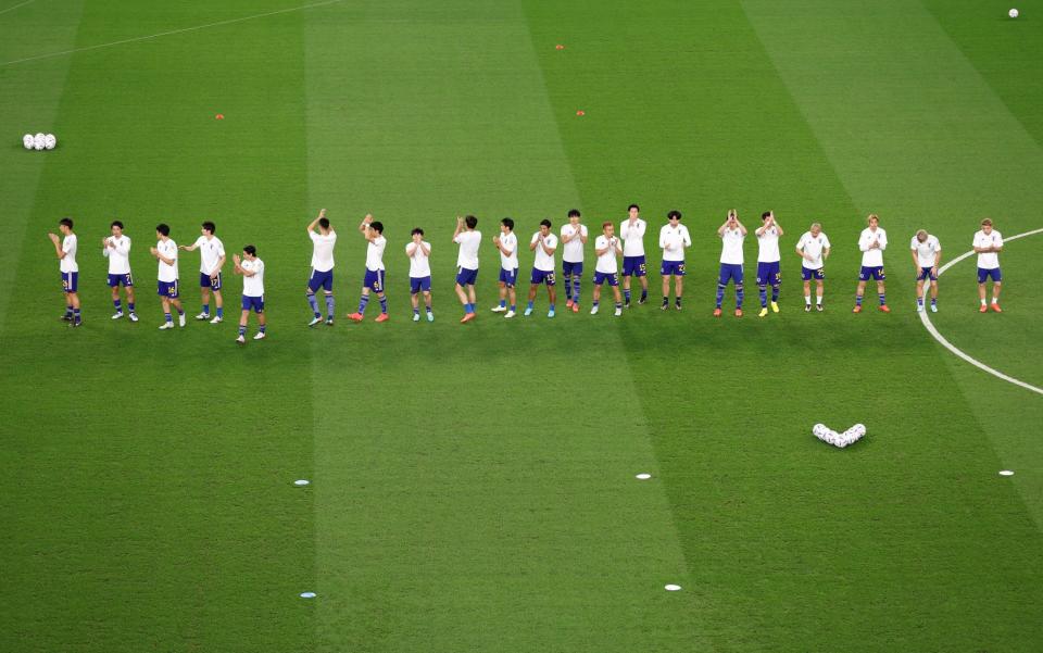 Japan players warm up - Getty