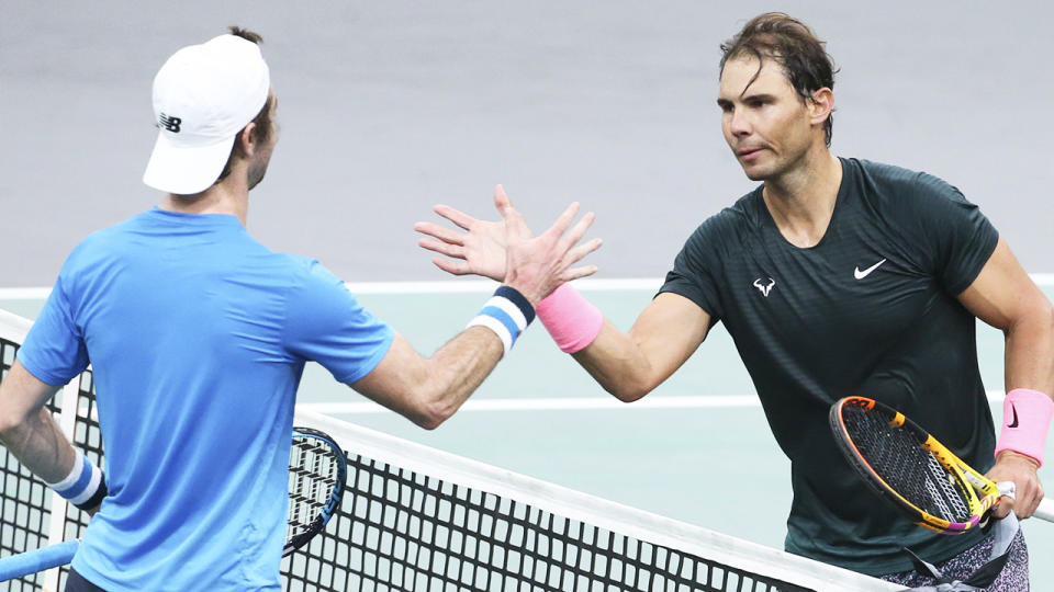 World no.2 Rafael Nadal shakes hands with Australia's Jordan Thompson after their match at the Paris Masters.