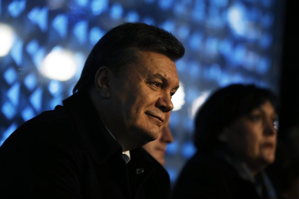 Ukrainian President Viktor Yanukovych watches the opening ceremony of the 2014 Winter Olympics, Friday, Feb. 7, 2014, in Sochi, Russia. (AP Photo/David Goldman, Pool)
