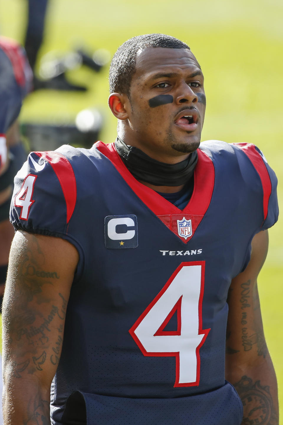 FILE- In this Dec. 13, 2020, file photo, Houston Texans quarterback Deshaun Watson walks off the field after warm ups before an NFL football game against the Chicago Bears in Chicago. On Friday, April 9, 2021, a judge has ordered that the name of one of the 22 women who have filed lawsuits accusing Watson of sexual assault and harassment must be made public. (AP Photo/Kamil Krzaczynski)