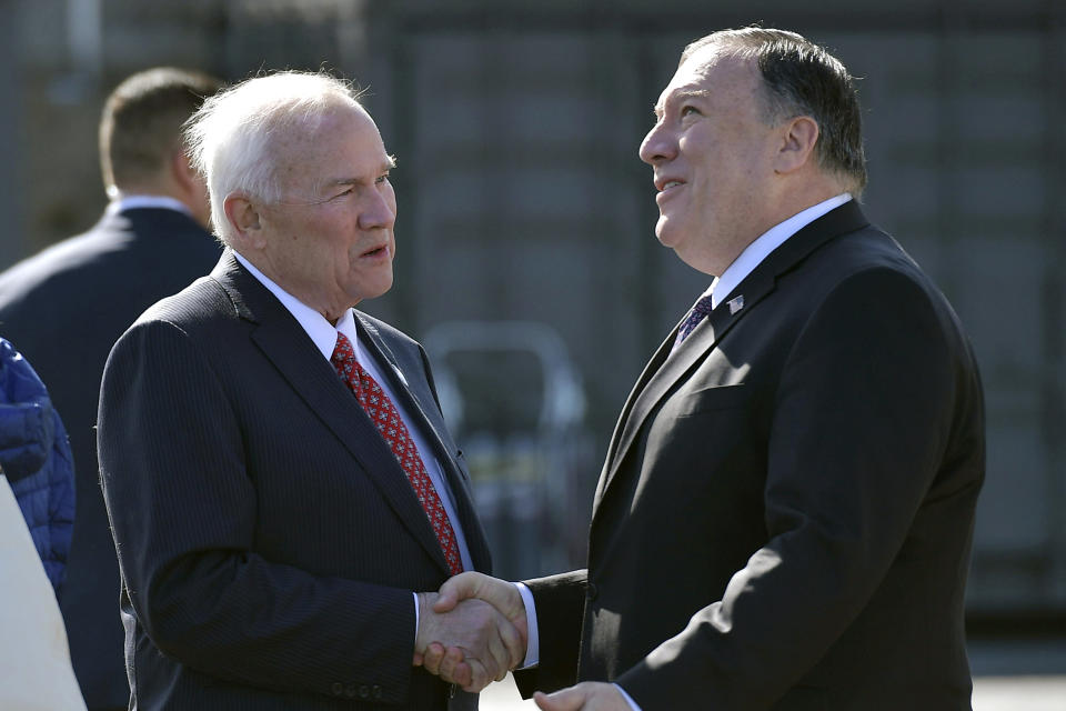 Secretary of State Mike Pompeo, right, shakes hands with the U.S. ambassador to Finland, Robert Frank Pence, after arriving in Rovaniemi, Finland, Monday, May 6, 2019. (Mandel Ngan/Pool Photo via AP)