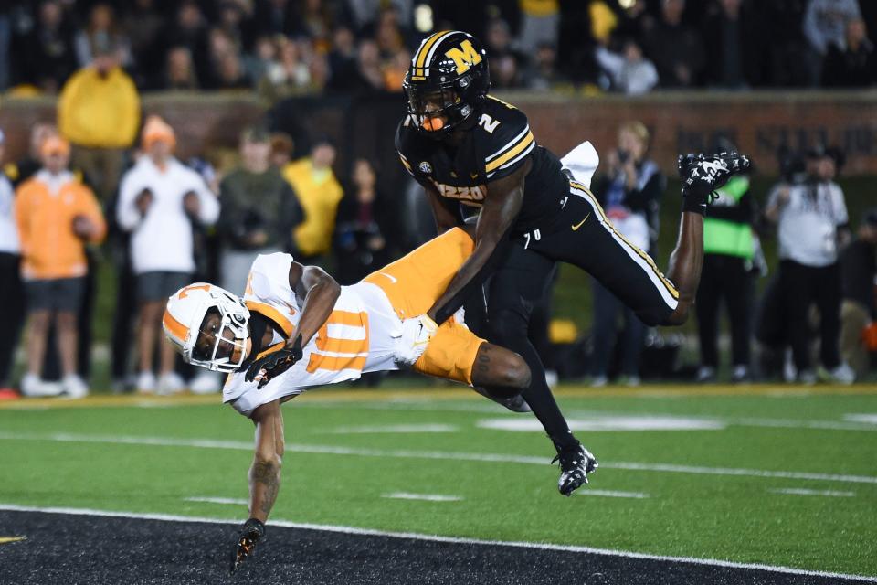 The ball is thrown past Tennessee wide receiver Squirrel White while covered by Missouri defensive back Ennis Rakestraw, Jr. during the game Saturday, Nov. 11, 2023 in Columbia, Missouri.