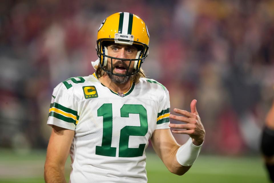 Green Bay Packers quarterback Aaron Rodgers (12) reacts against the Arizona Cardinals at State Farm Stadium.