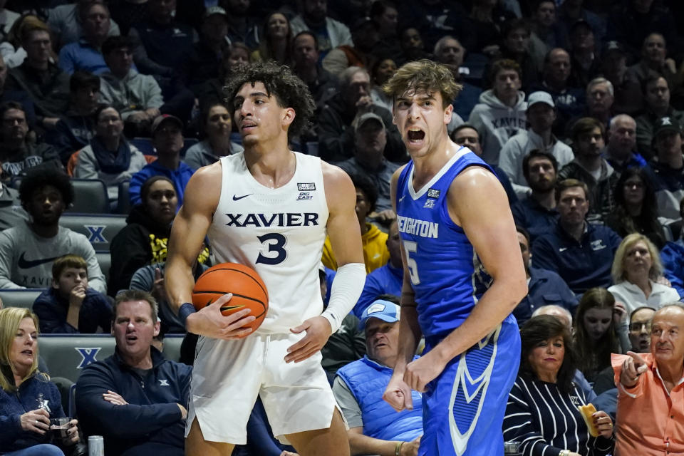 Creighton's Francisco Farabello (5) reacts after Xavier's Colby Jones (3) is called out of bounds during the first half of an NCAA college basketball game, Wednesday, Jan. 11, 2023, in Cincinnati. (AP Photo/Jeff Dean)